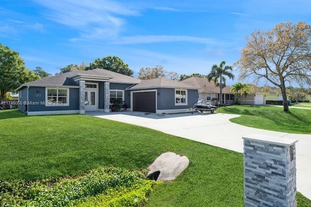 ranch-style house with a garage and a front yard