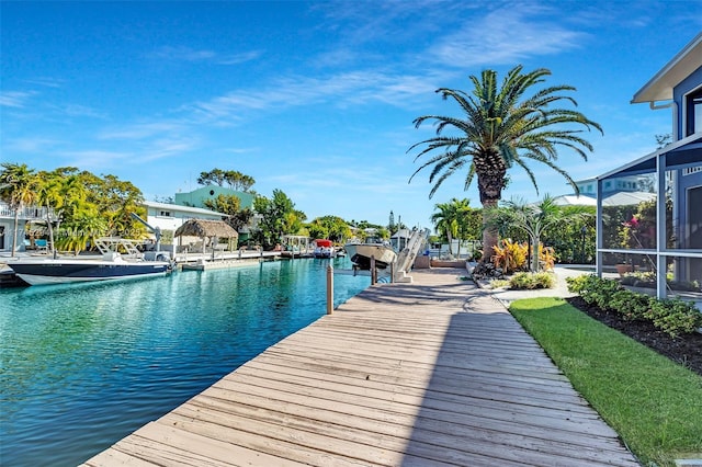 view of swimming pool featuring a dock