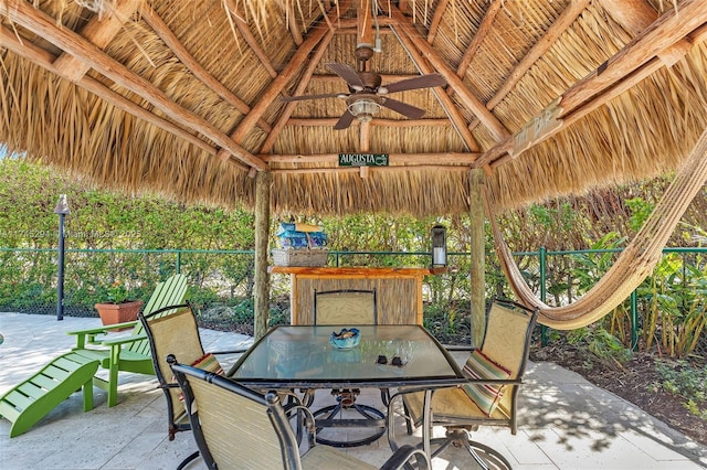 view of patio with a gazebo and ceiling fan