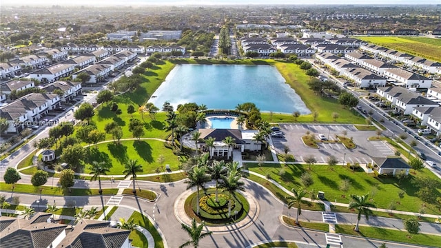 aerial view featuring a water view and a residential view