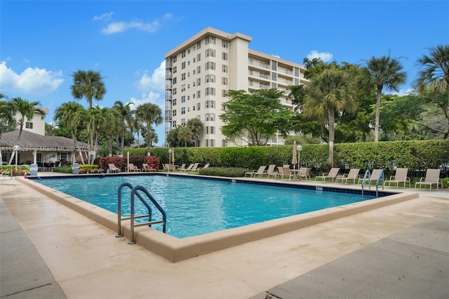 view of swimming pool featuring a patio area