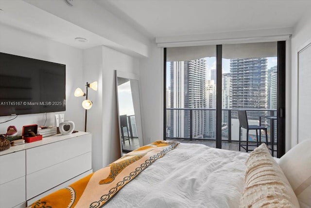 bedroom with expansive windows