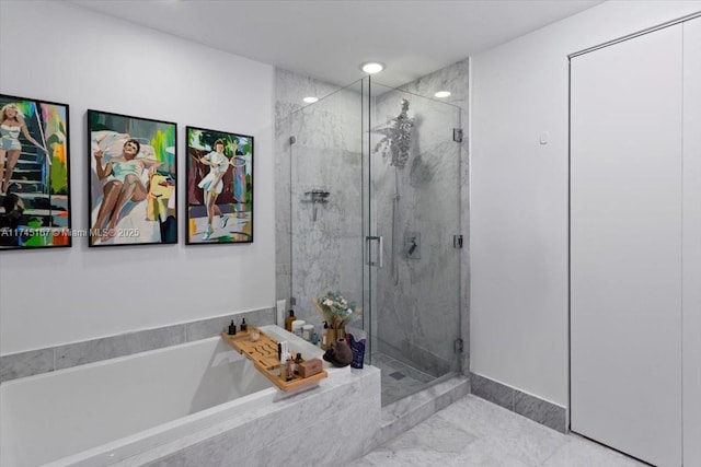 bathroom with separate shower and tub