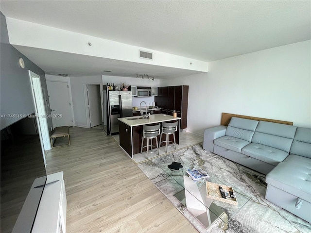 1900 N Bayshore Dr Unit 4007, Miami, FL 33132 - living room featuring visible vents and light wood-style floors