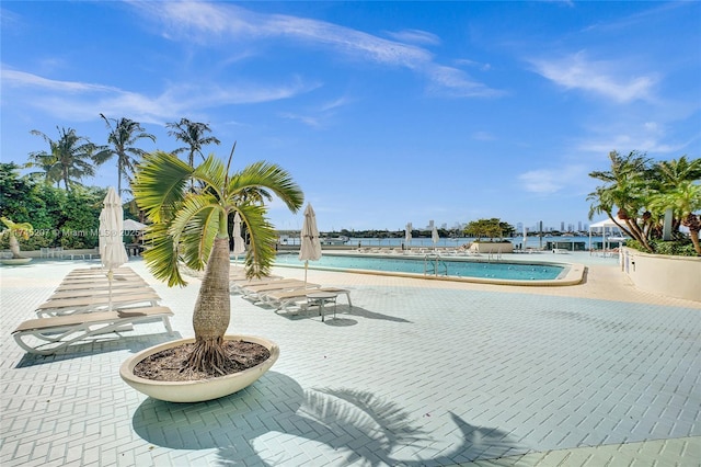 community pool featuring a patio