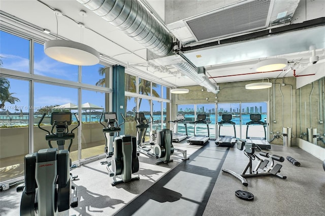 gym with a water view