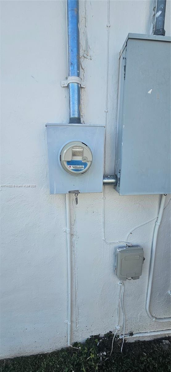 exterior details featuring electric meter