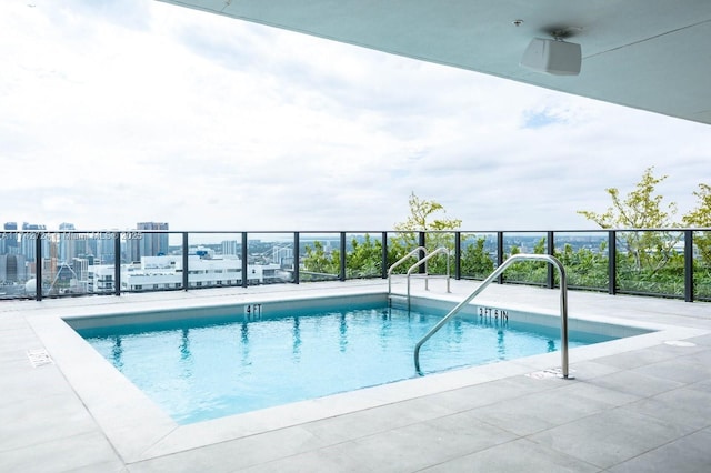 view of pool with a patio area