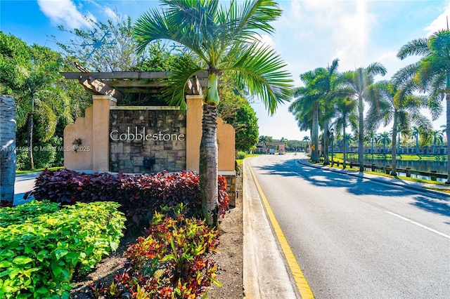 view of community sign