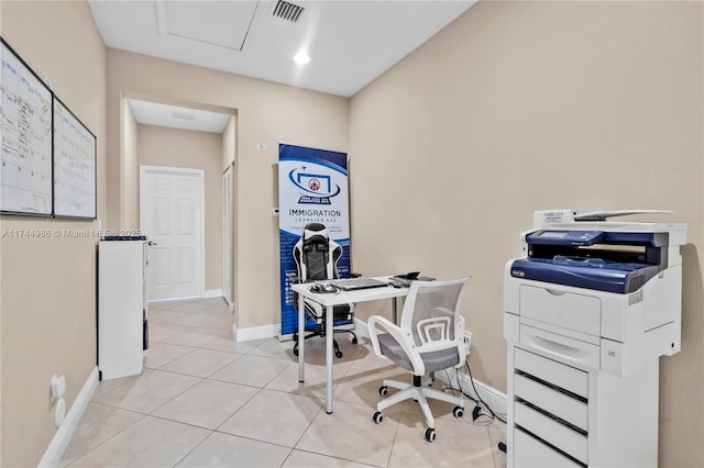 office space featuring visible vents, baseboards, and light tile patterned flooring