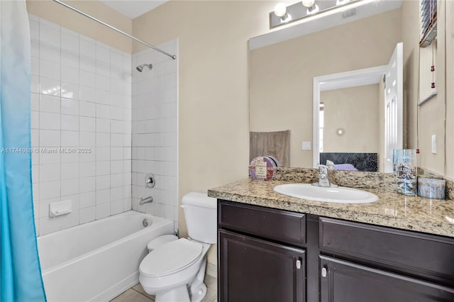 ensuite bathroom with ensuite bathroom, vanity, visible vents, toilet, and shower / tub combo
