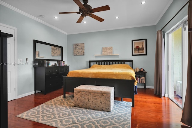 bedroom featuring ceiling fan, ornamental molding, and dark hardwood / wood-style flooring