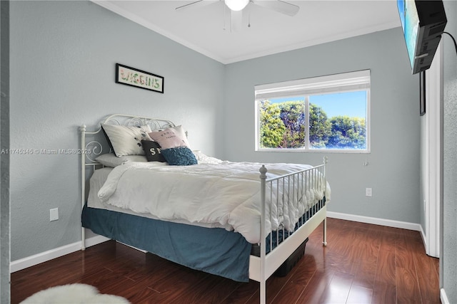 bedroom with wood-type flooring, ceiling fan, and crown molding