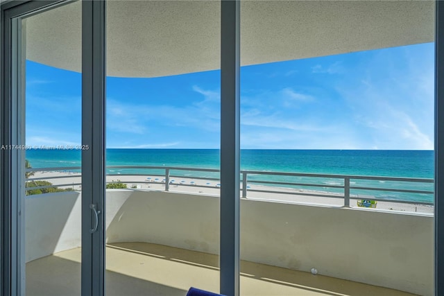 property view of water with a beach view