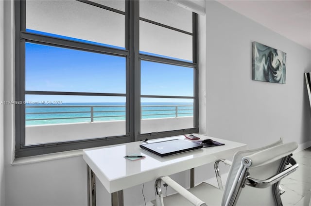 office with a water view and a beach view