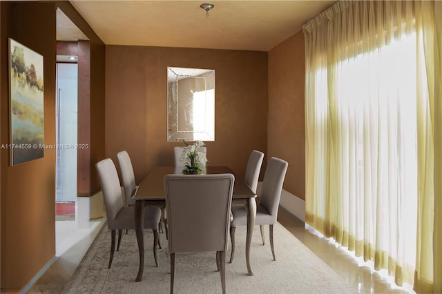 dining space with plenty of natural light