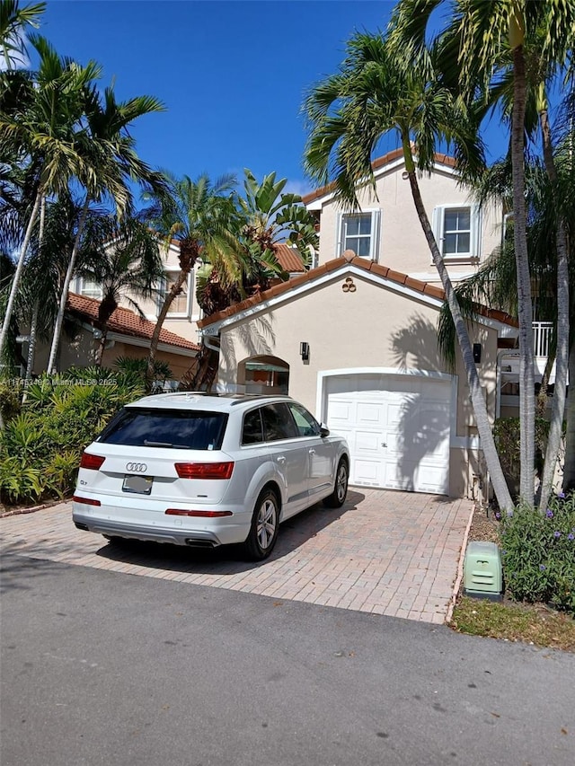 view of front of property featuring a garage