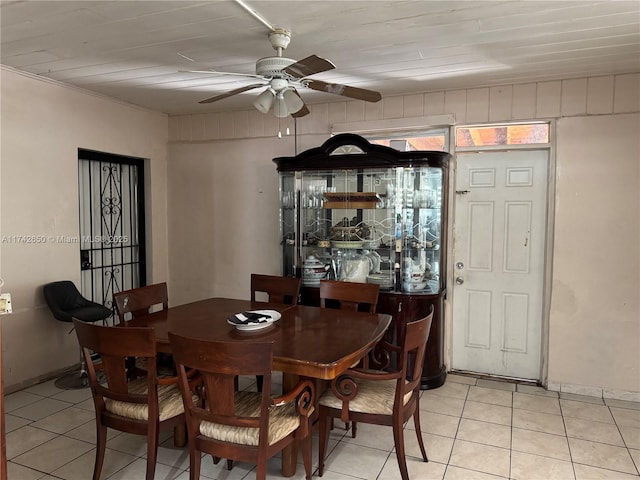1445 NE 136th St, North Miami, FL 33161 - dining area featuring a ceiling fan and light tile patterned floors
