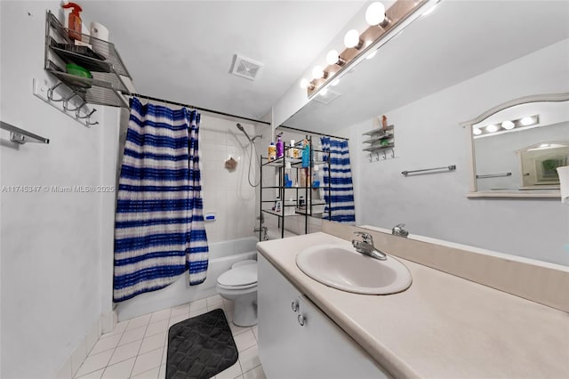 full bathroom with shower / tub combo with curtain, vanity, toilet, and tile patterned flooring