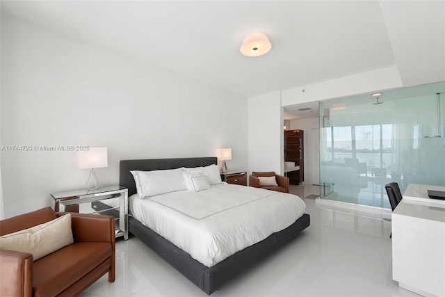 bedroom featuring light tile patterned floors