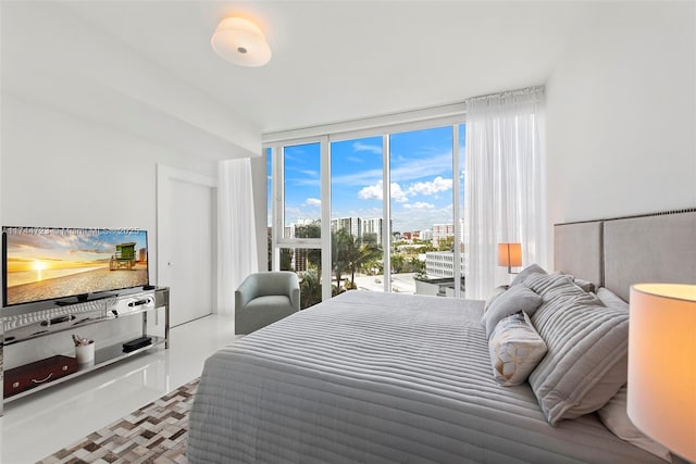 bedroom with a wall of windows