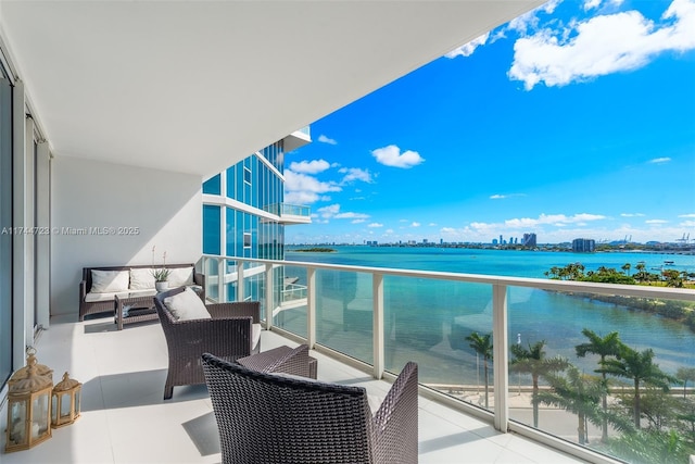 balcony featuring a water view