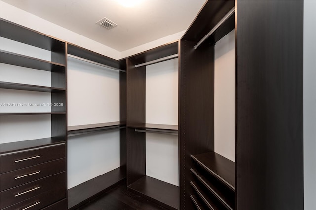 2711 S Ocean Dr Unit 3302, Hollywood, FL 33019 - walk in closet with dark wood-type flooring