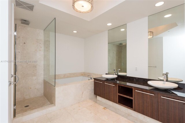 2711 S Ocean Dr Unit 3302, Hollywood, FL 33019 - bathroom featuring plus walk in shower and vanity