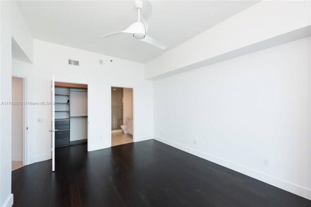 2711 S Ocean Dr Unit 3302, Hollywood, FL 33019 - unfurnished bedroom with connected bathroom, a closet, dark hardwood / wood-style floors, and ceiling fan