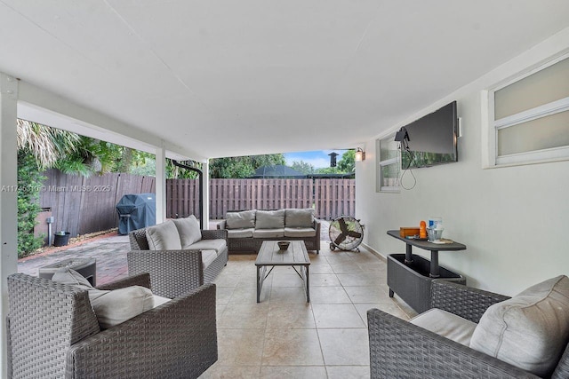 view of patio / terrace with an outdoor living space and a grill