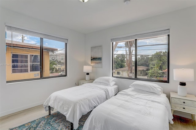 bedroom featuring light wood-type flooring