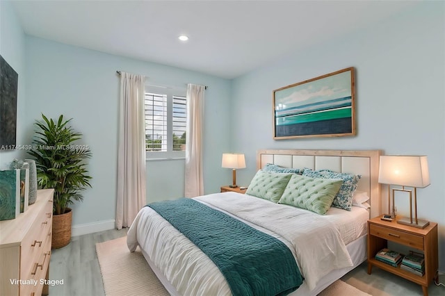 bedroom featuring light wood-type flooring