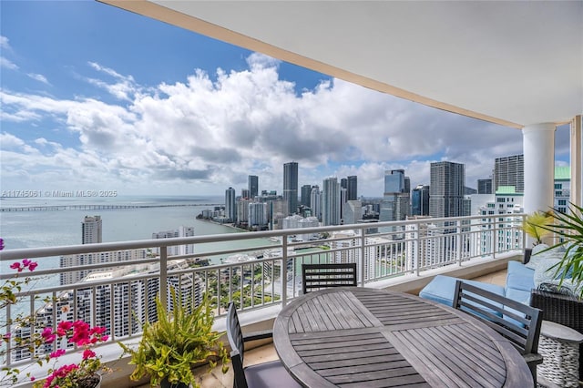 balcony featuring a water view