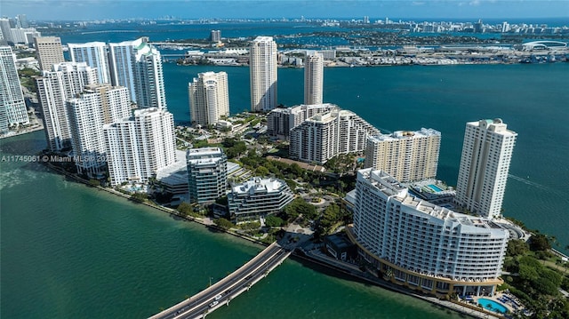 birds eye view of property featuring a water view