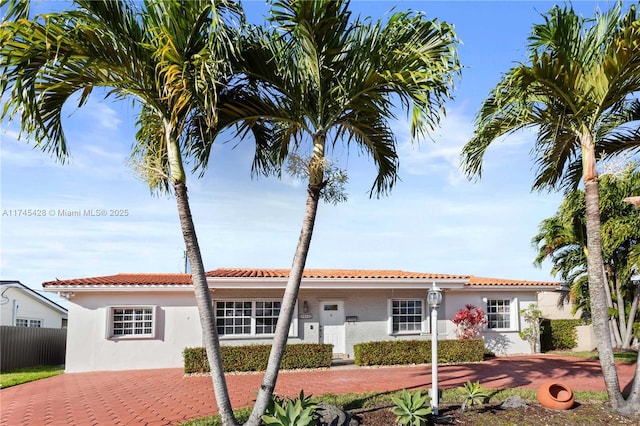 mediterranean / spanish-style house featuring a patio