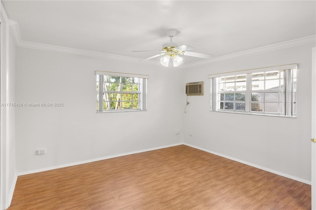 unfurnished room with ornamental molding, an AC wall unit, ceiling fan, and light hardwood / wood-style flooring