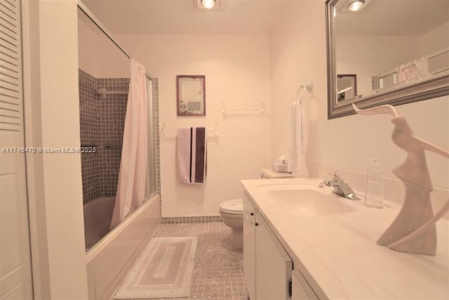 full bathroom with tile patterned flooring, vanity, shower / bath combination with curtain, and toilet