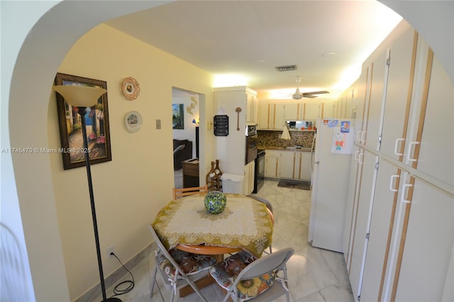 dining area featuring ceiling fan