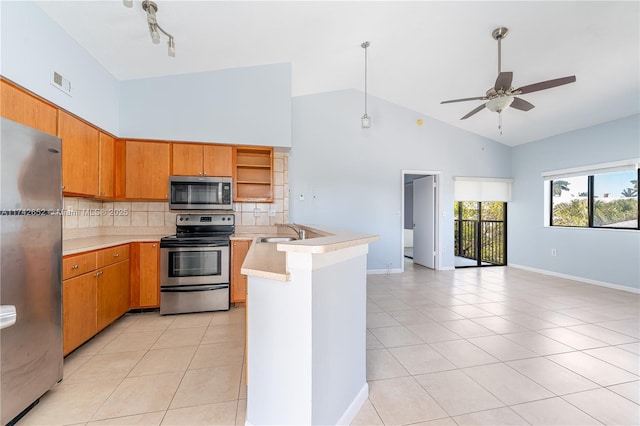 kitchen with visible vents, open shelves, stainless steel appliances, a peninsula, and light tile patterned flooring