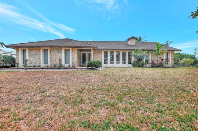17500 SW 68th Ct, Southwest Ranches, FL 33331 - view of front of house featuring stone siding and a front yard