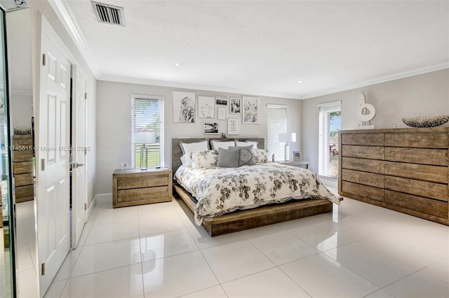 17500 SW 68th Ct, Southwest Ranches, FL 33331 - bedroom with crown molding, baseboards, light tile patterned floors, and visible vents
