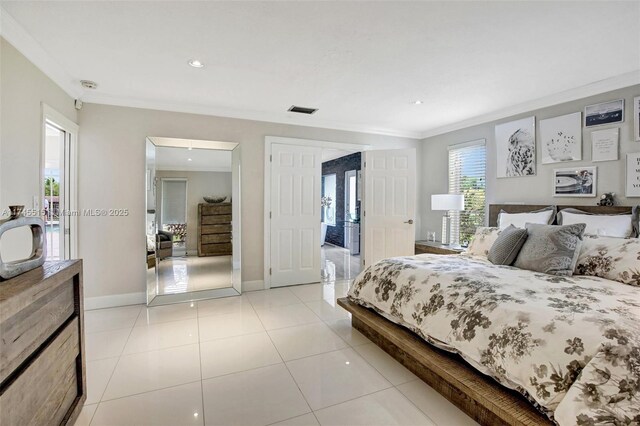 17500 SW 68th Ct, Southwest Ranches, FL 33331 - bedroom with crown molding, light tile patterned flooring, recessed lighting, baseboards, and visible vents