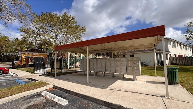 view of community featuring a playground and a mail area