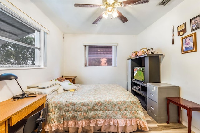 bedroom featuring ceiling fan and light hardwood / wood-style flooring