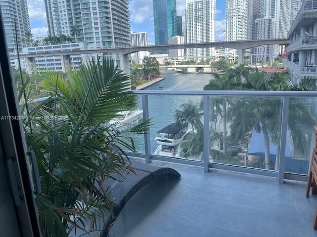 185 SW 7th St Unit 503, Miami, FL 33130 - balcony with a city view and a water view