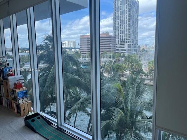 185 SW 7th St Unit 503, Miami, FL 33130 - doorway featuring a city view and carpet