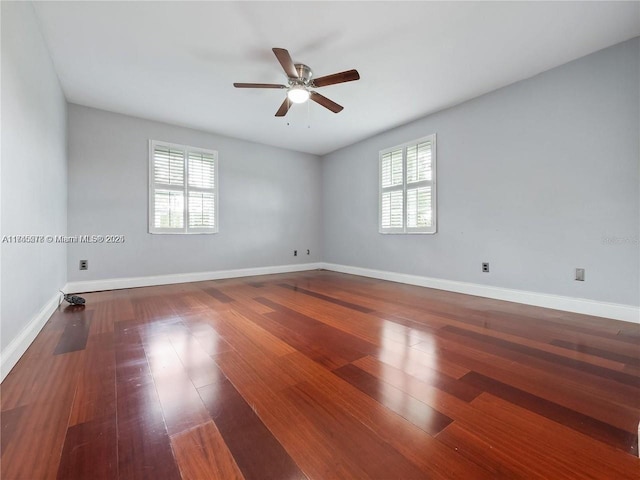 unfurnished room with wood-type flooring and ceiling fan