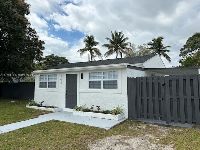 view of outdoor structure featuring fence