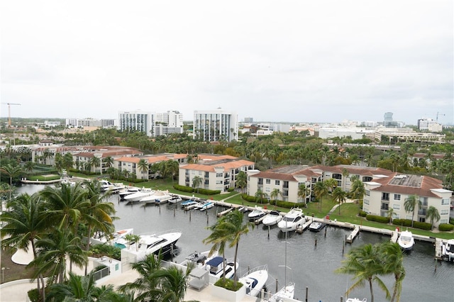 aerial view featuring a water view and a city view