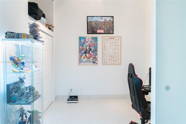 tiled office space with baseboards